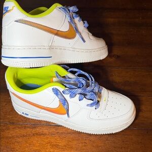 Nike Sneakers with Orange and Blue Accents
